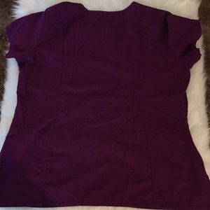 Grey's Anatomy Tops - Grey’s Anatomy Ladies Scrub Top in Purple Grey's Anatomy Tops - Grey’s Anatomy Ladies Scrub Top in Purple